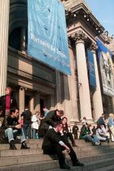 People watching on the steps of the Metropolitan Museum of Art