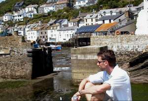 Eating a picnic-lunch on the walls above the harbor.