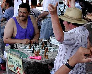 I can only conclude that the grand master (the guy on the left) must have lost to his opponent.